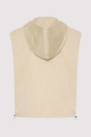 Back view of the Cotton Sleeveless Parka in Champagne, emphasizing the sleek design and stylish allure of this must-have sleeveless parka coat.