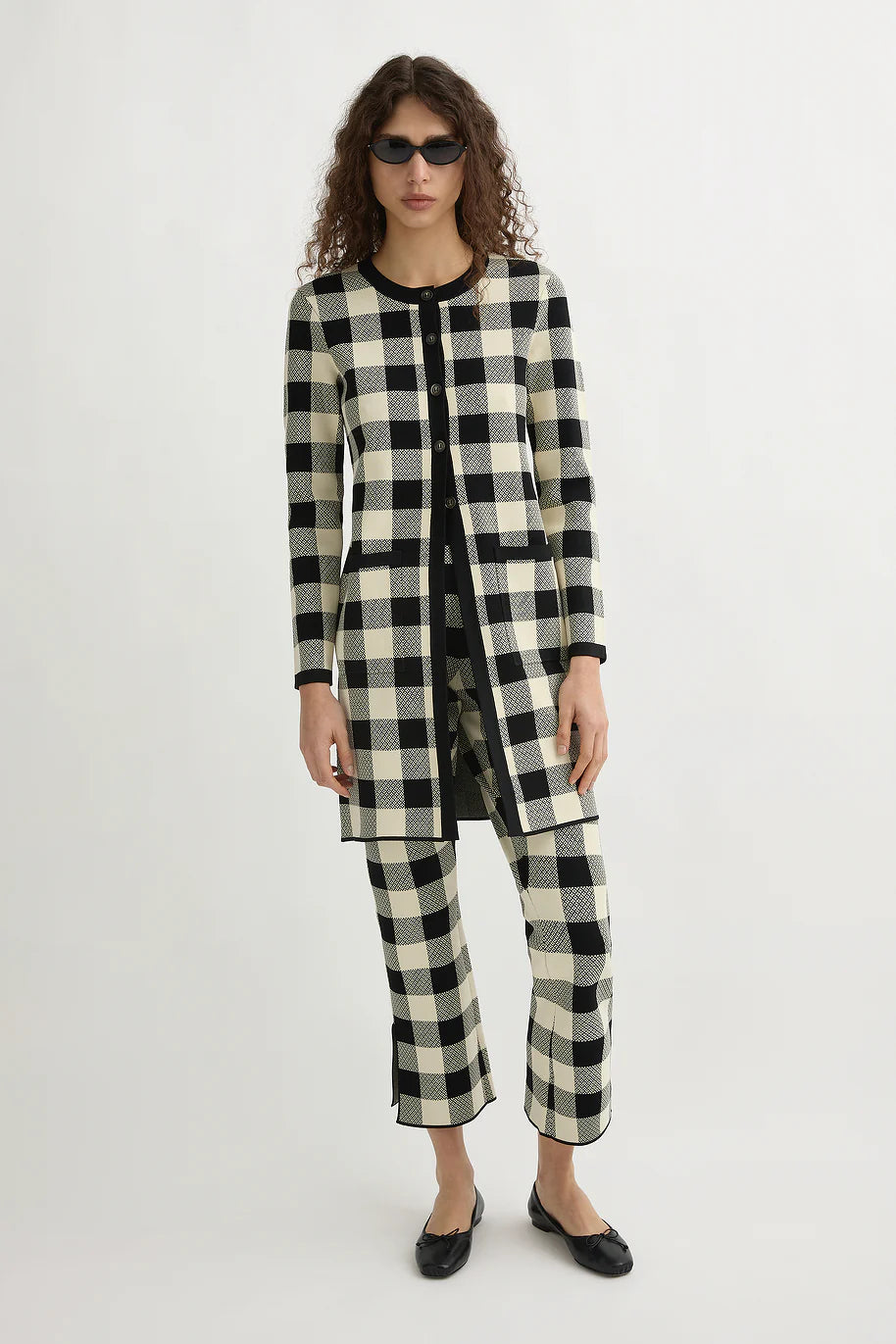 Close-up of Pippa Cardigan in Heritage Plaid with visible patch pockets and exclusive pattern by Posse.
