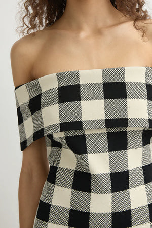 Pippa Strapless Top in Heritage Plaid displayed on a mannequin, emphasizing its trendy off-the-shoulder neckline.