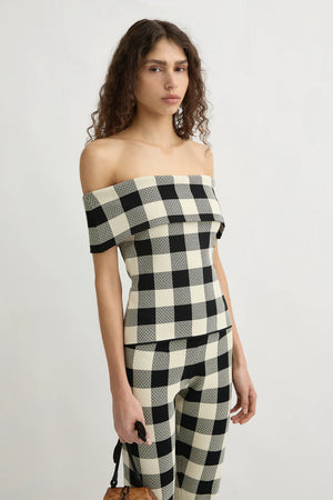 Back view of the Pippa Strapless Top in Heritage Plaid highlighting its stylish design and casual elegance.