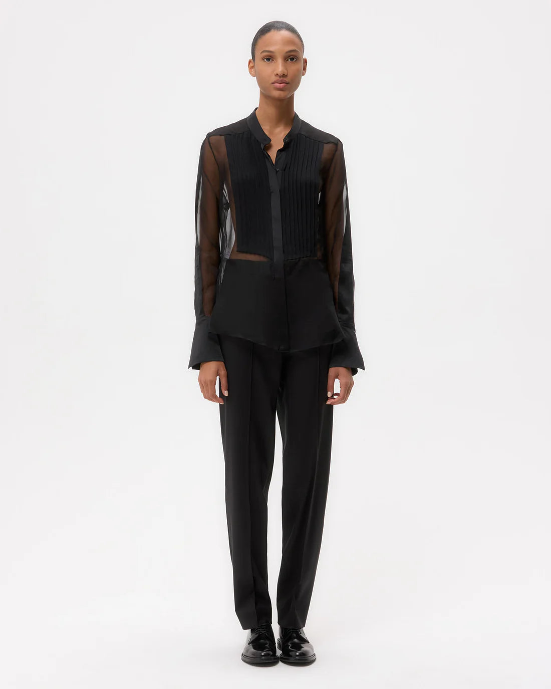 Close-up of the Peyton Top in Black, highlighting the textured silk organza and elegant double-layered French cuffs.