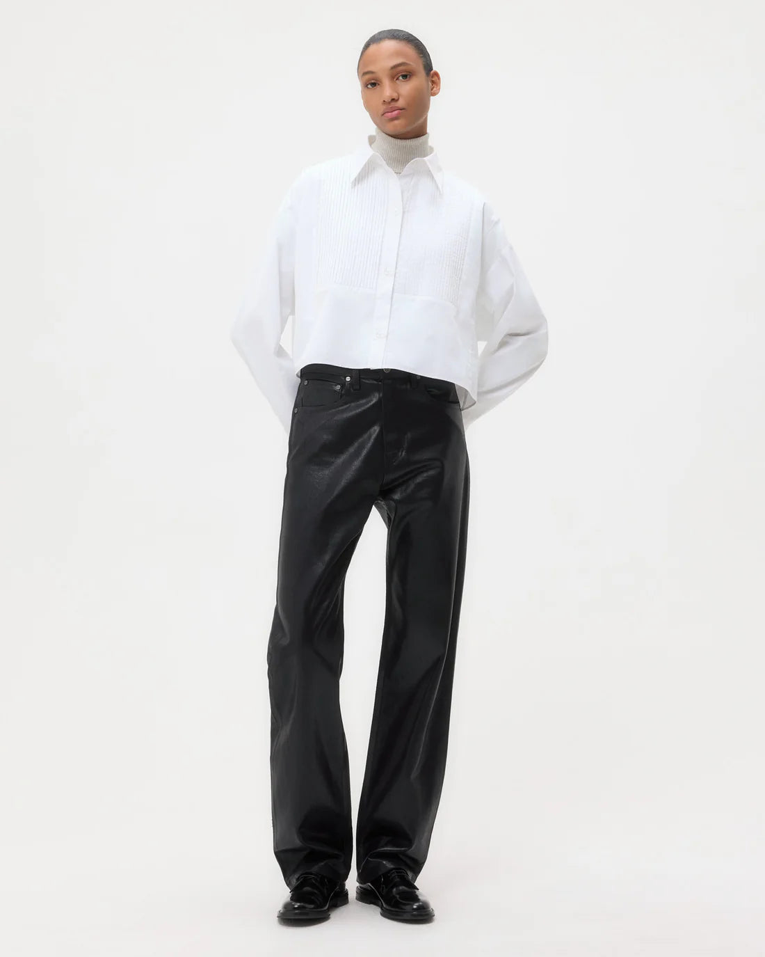 Back view of TWP Soon To Be Ex in white, highlighting the boxy silhouette and single-pick up button cuffs.