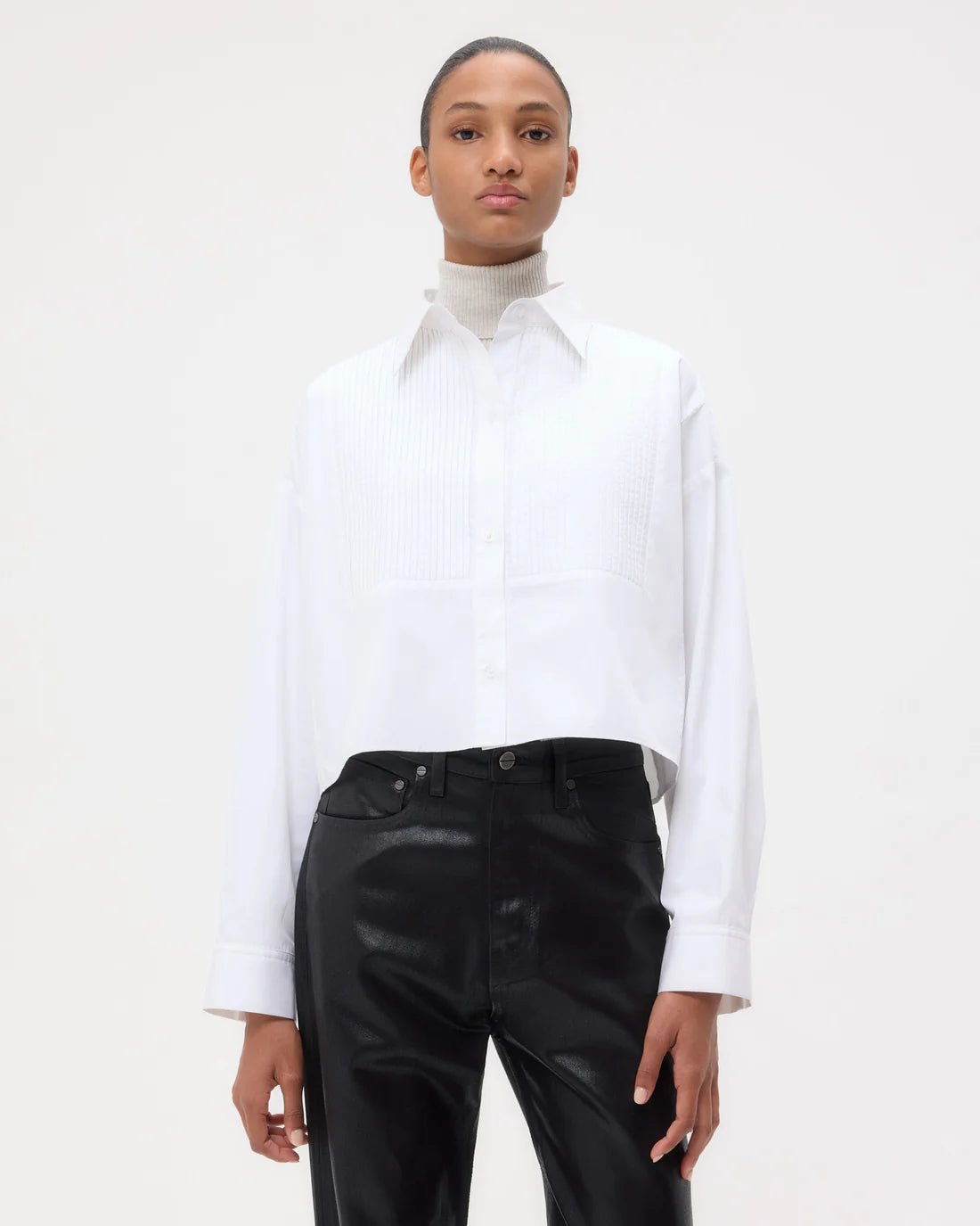 Side profile of the Soon To Be Ex shirt by TWP in white, emphasizing the chest patch pocket and button-up placket.