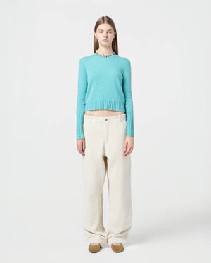 Close-up of the Shrunken Crew in Glacier highlighting the rib trim hem and signature branding.
