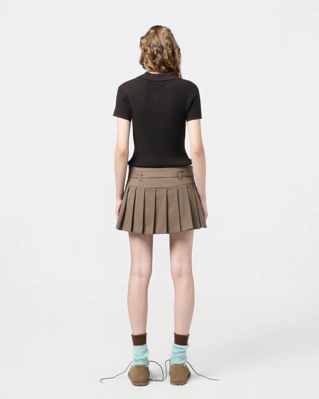 Back view of the Shrunken Polo in Burnt Cocoa, featuring the signature branding at the center back neck.
