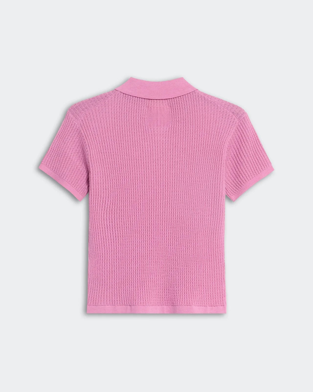 Flat lay of the Shrunken Polo in Rose revealing its soft texture and vibrant color.