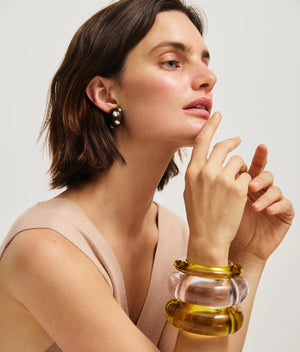 Close-up of Acacia Earrings in Amazonite showcasing intricate gold-plated brass details and natural elements.