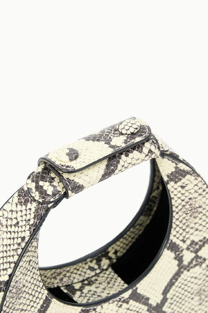 The Goodnight Moon Bag in White Snake by Staud displayed elegantly on a neutral background.