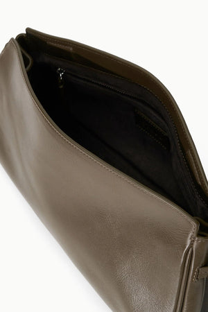 A detailed look at the Maude Soft Clutch in Truffle, highlighting the soft leather and stylish knots.