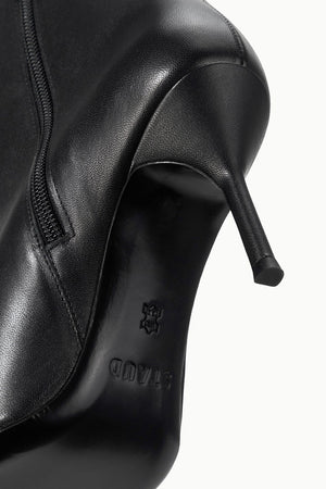 Staud Sebastian Ankle Boot in black, perfect for elevating your wardrobe with a chic touch.