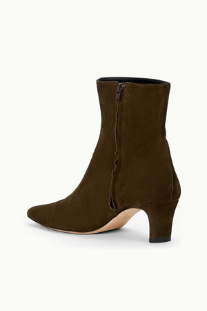 Stylish side view of Wally Ankle Boot in Truffle Suede with a zip closure.