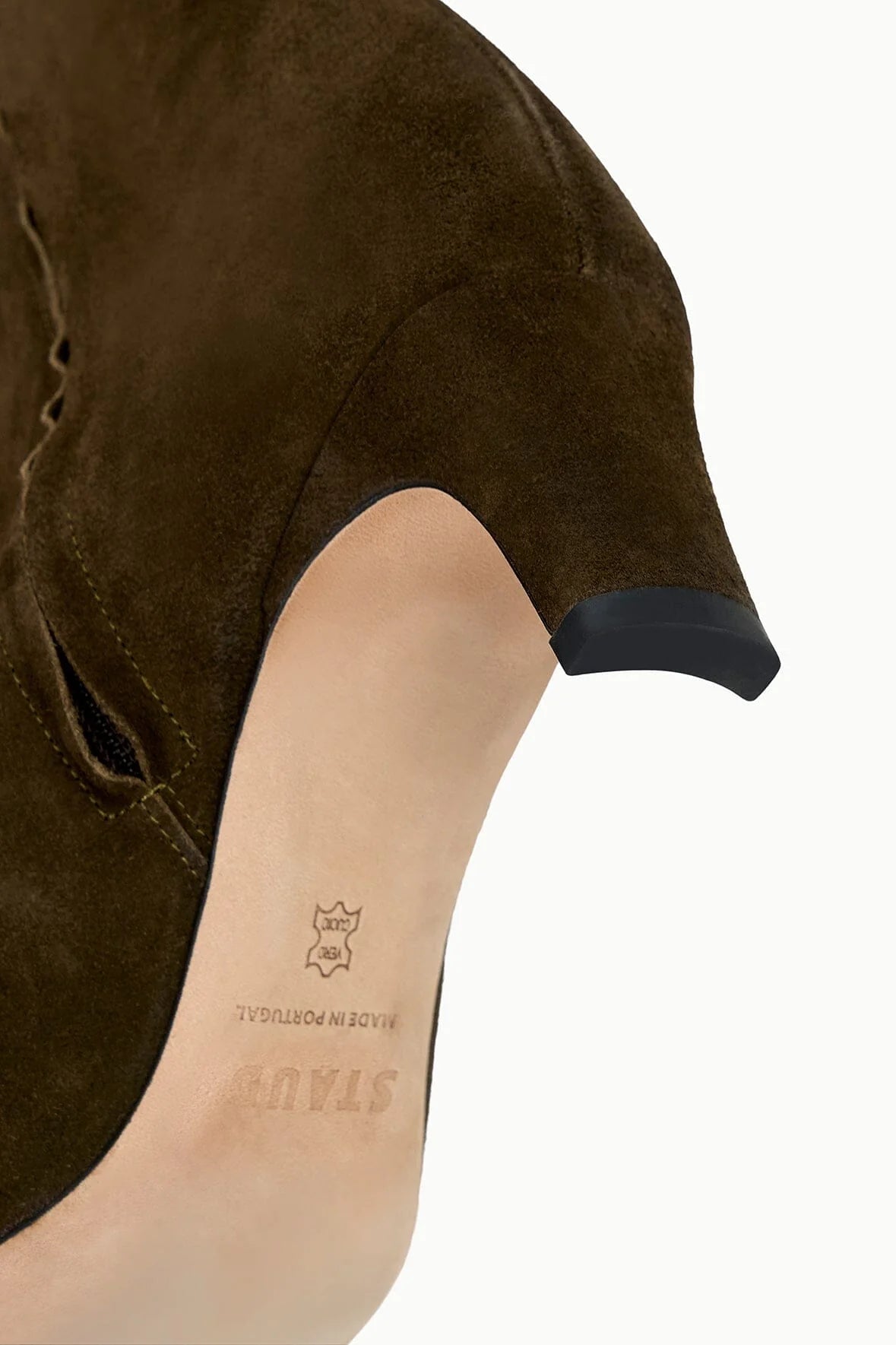 Close-up of Wally Ankle Boot's texture in Truffle Suede, featuring premium calf leather.
