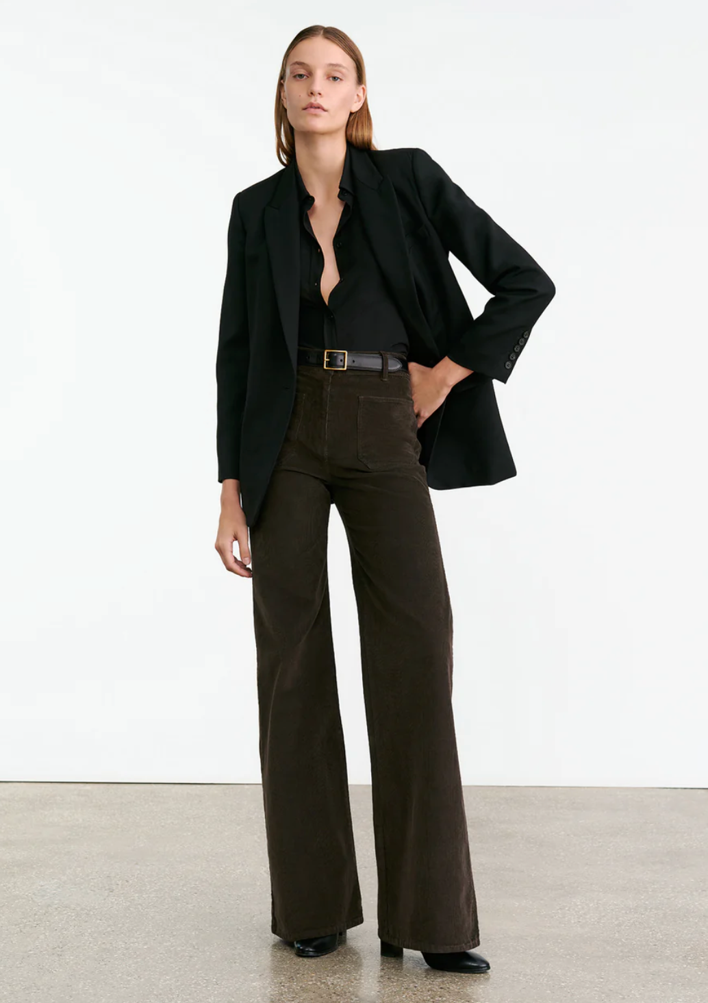 Flat lay of Florence Corduroy Pant in Chocolate Brown, showcasing its luxurious fabric and rich color.