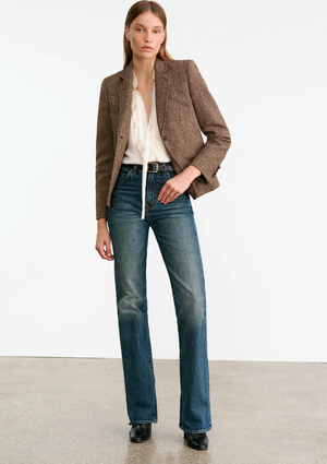 Back view of the Lyon Jacket in Brown Donegal featuring Western style details on the yoke.