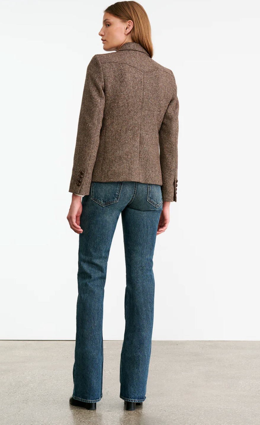 Close-up of the Lyon Jacket in Brown Donegal highlighting the leather woven buttons and texture.