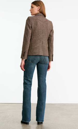 Close-up of the Lyon Jacket in Brown Donegal highlighting the leather woven buttons and texture.