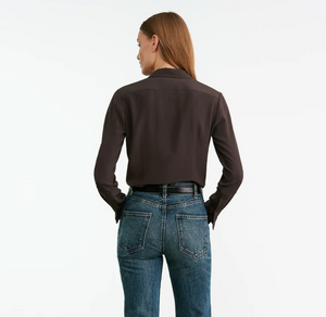 Model wearing the Simone Silk Shirt in Chocolate Brown by Nili Lotan, styled casually for an everyday look.