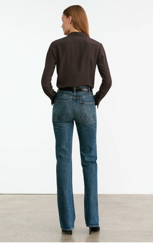 Side view of the Simone Silk Shirt in Chocolate Brown by Nili Lotan, emphasizing the tailored fit and silhouette.