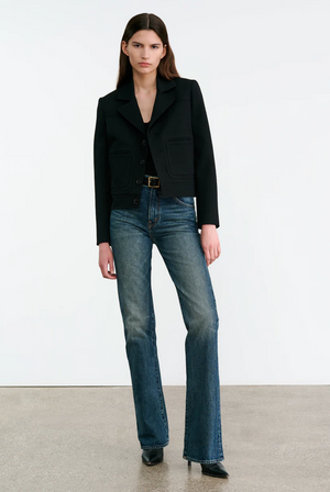 Side view of the Nili Lotan Georgy Jacket in Black highlighting full-length sleeves and back yoke details.