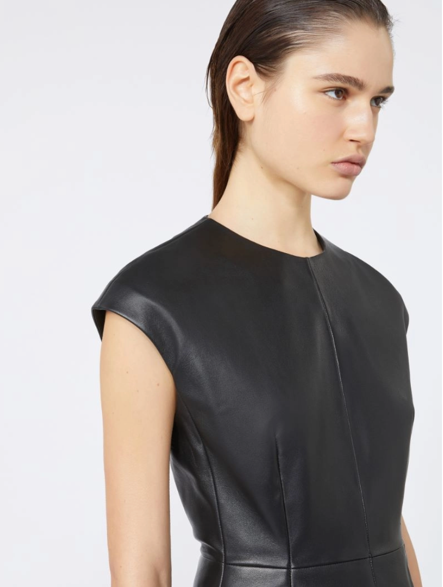 Full view of the Sportmax Tefrite Leather Dress in Black, emphasizing its chic and trendy design.