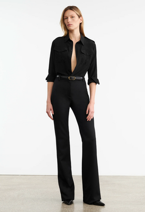 Close-up of the fabric texture of Corette Pant in Black, made from 100% virgin wool by Nili Lotan.