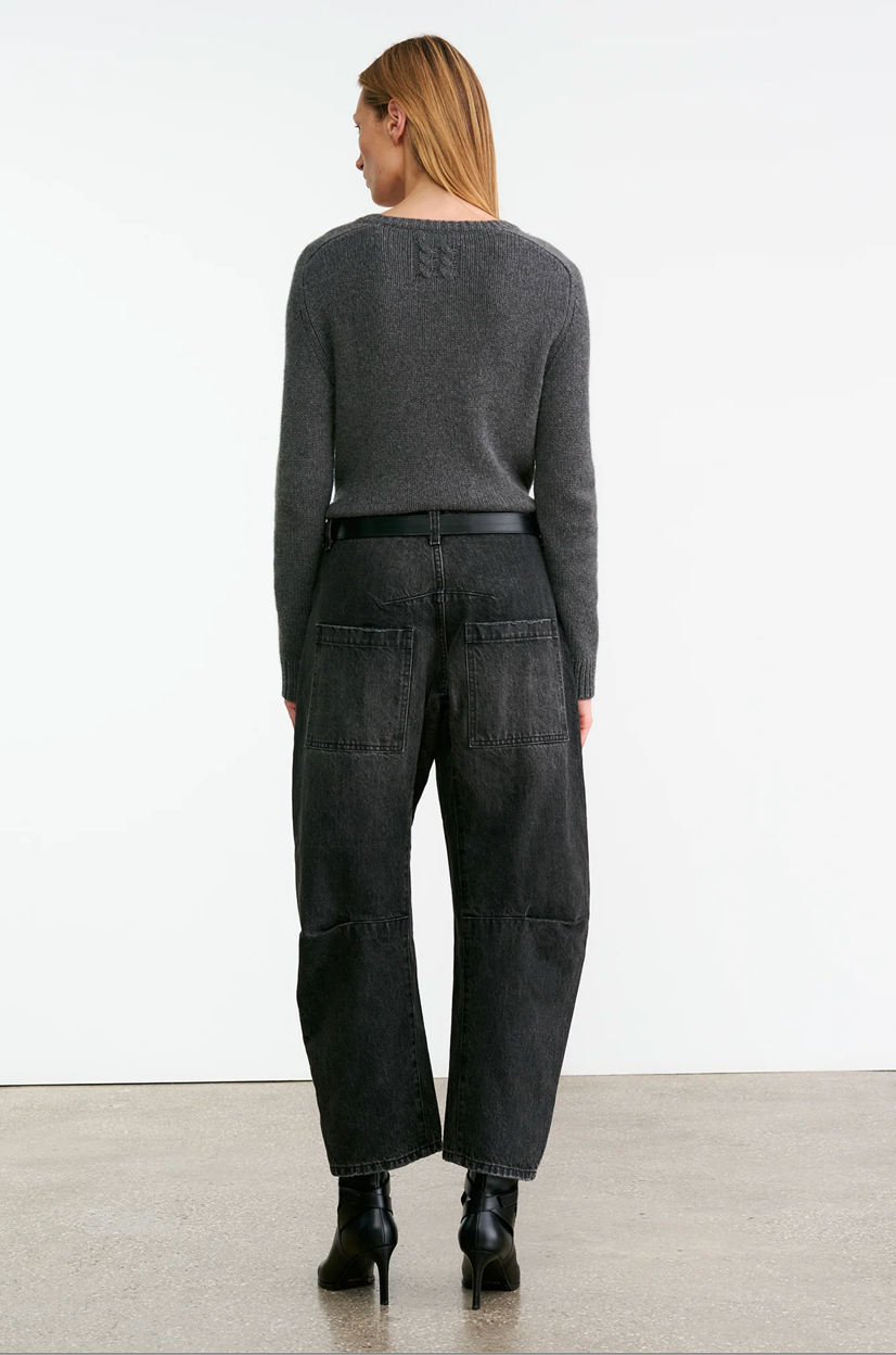 Back view of Nili Lotan Shon Jean in Stone Black Wash highlighting top-stitched back pockets.