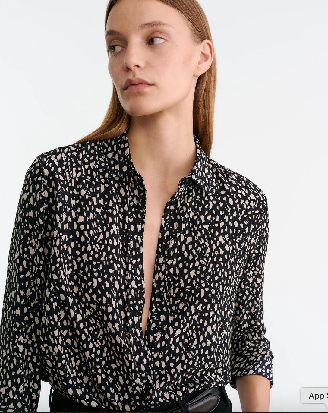 Gaia Slim Shirt in Black/Stone Cheetah Print displayed flat, emphasizing the stylish collar and button-up design.