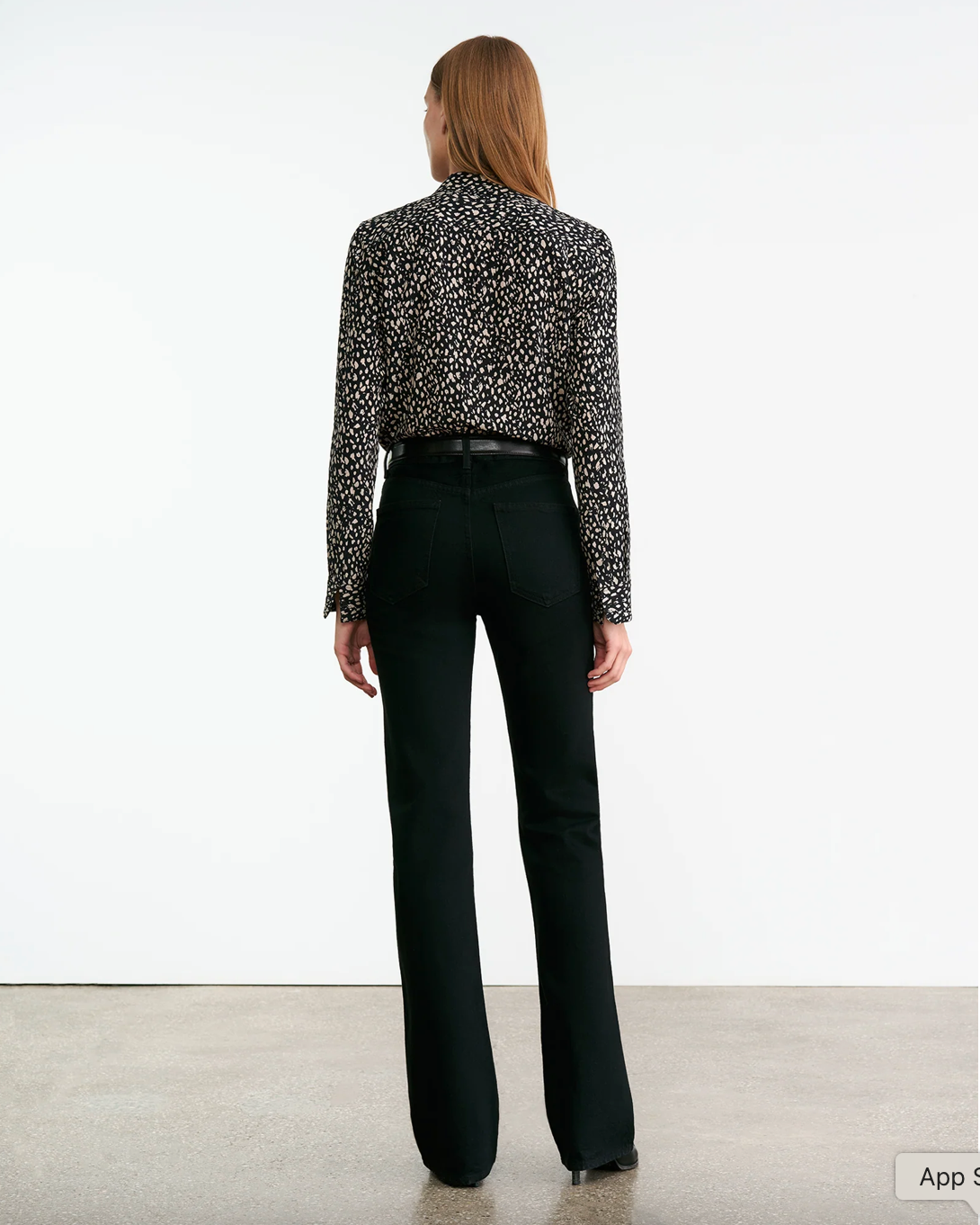 Model wearing the Gaia Slim Shirt in Black/Stone Cheetah Print, styled for a chic casual look.