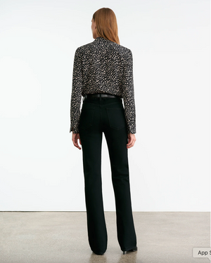 Model wearing the Gaia Slim Shirt in Black/Stone Cheetah Print, styled for a chic casual look.