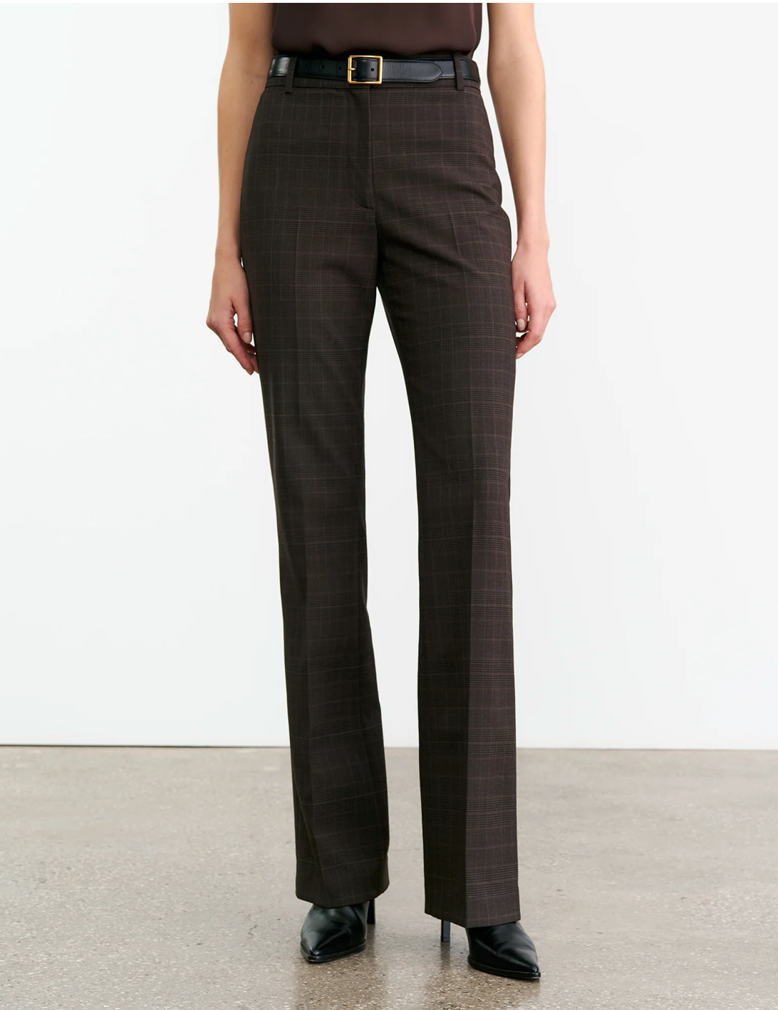 Close-up of Corette Wool Pant in Cigar Plaid by Nili Lotan, emphasizing fabric texture and quality.