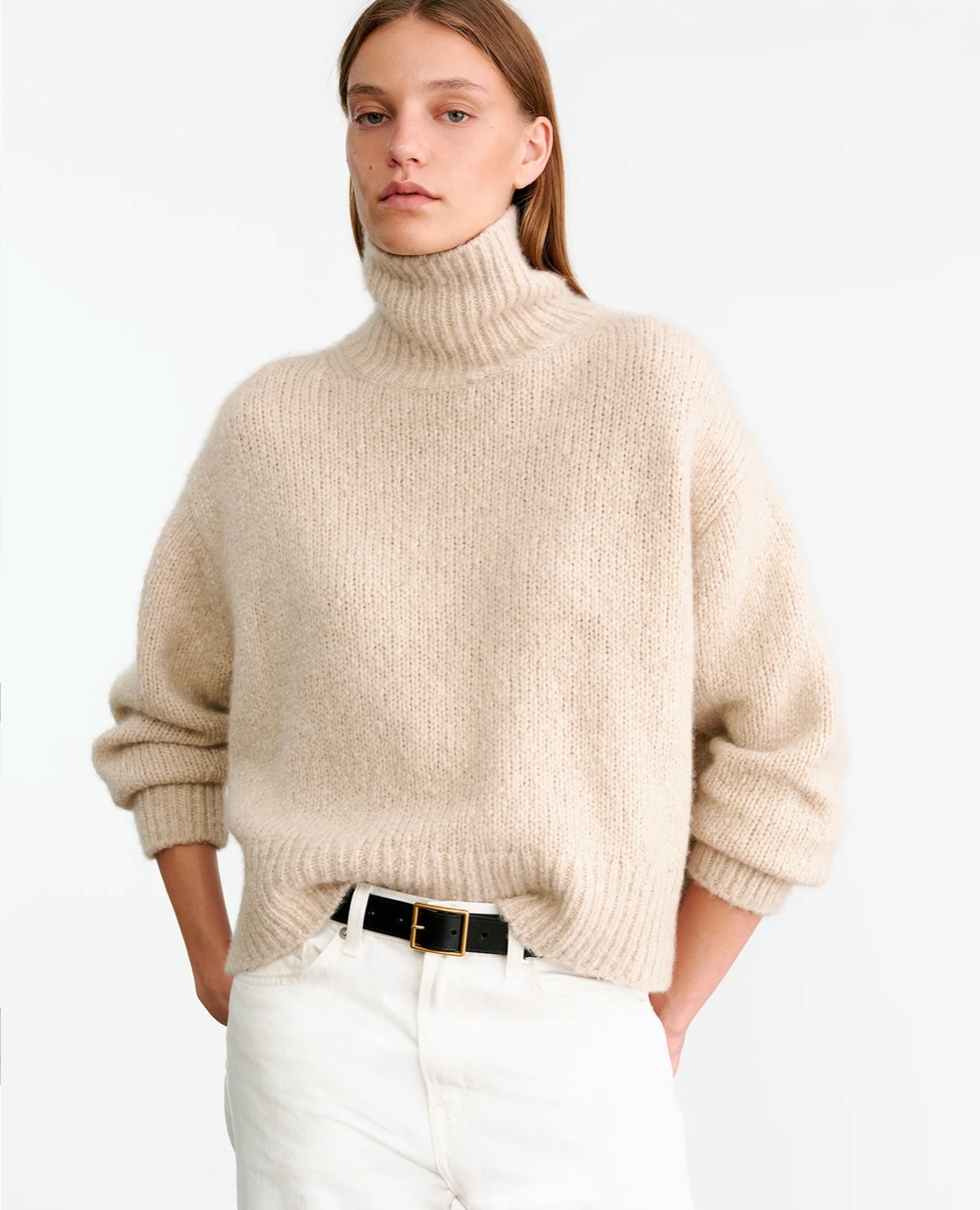 Full view of the Tabitha Sweater in Beige Melange emphasizing its boxy fit and elegant silhouette.