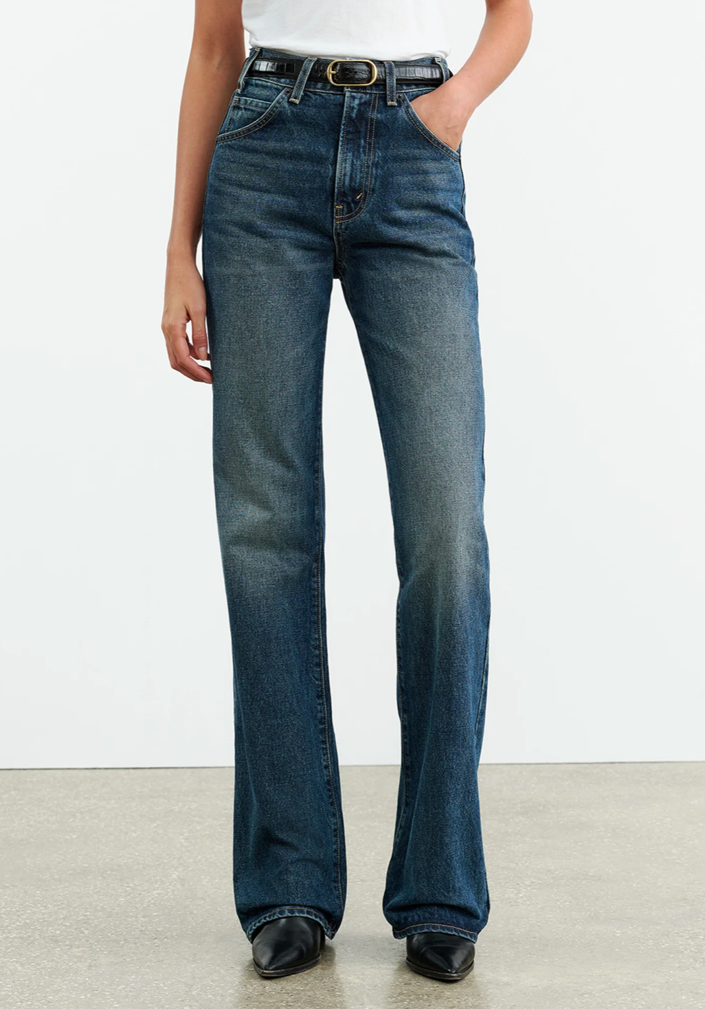 Back view of Nili Lotan's Joan Jean in Classic Wash highlighting the belt loops and classic denim look.
