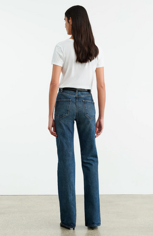 Nili Lotan Joan Jean in Classic Wash displayed on a model, emphasizing the fitted waist and hips.