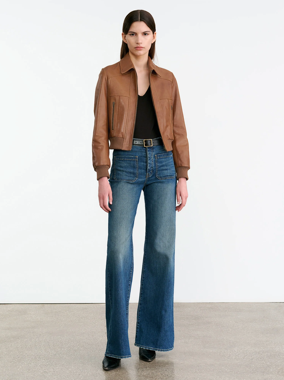 Close-up of the Sue Leather Jacket in Cognac, showcasing the novelty seam details and rib trim.