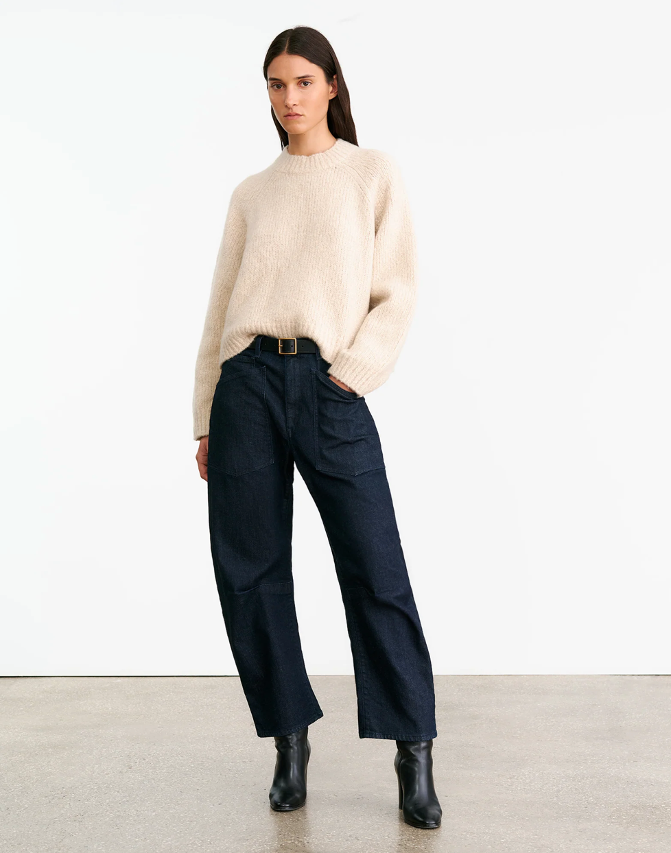 Close-up of Tomaso Sweater in Beige Melange detailing the soft cashmere and silk fabric composition.