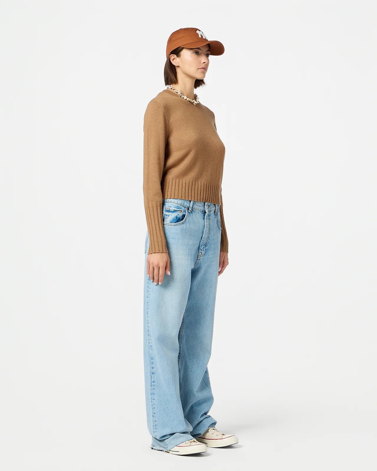 Shrunken Crew in Almond displayed on a model highlighting its slim fit design.