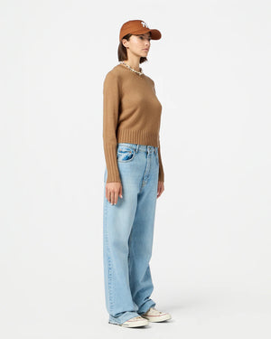 Shrunken Crew in Almond displayed on a model highlighting its slim fit design.