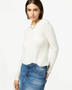 Flat lay of Shrunken Crew in Cream showing its luxurious texture and casual style.
