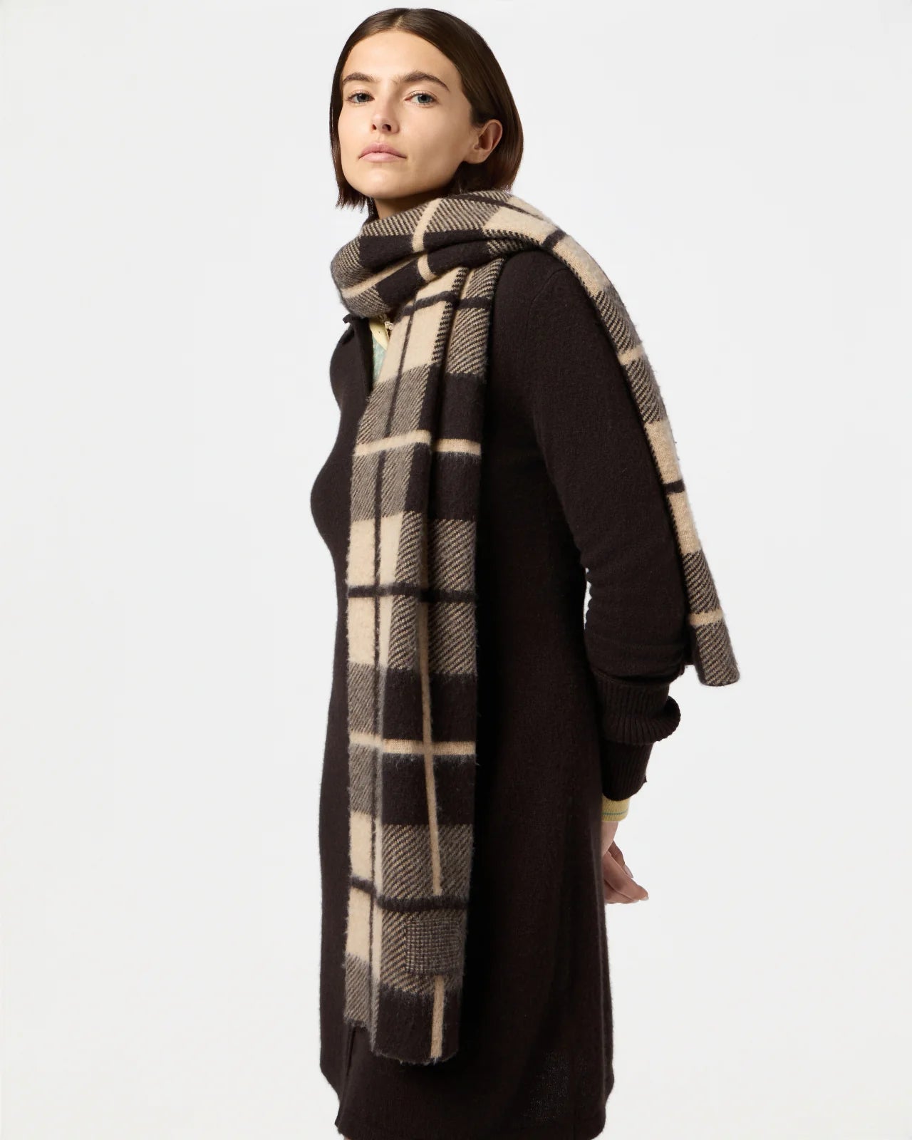 Close-up of the Plaid Big Scarf in Burnt Cocoa/Dune, highlighting the jacquard knit and signature branding detail.