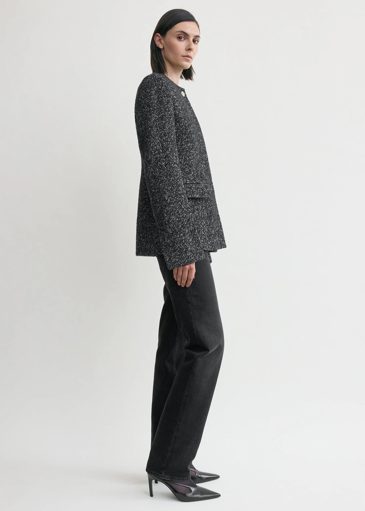 Model wearing the Collarless Cinched Jacket in Black/White, demonstrating its stylish fit and cinched waist.
