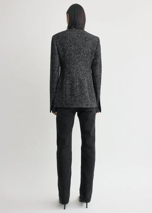 Back view of the Collarless Cinched Jacket in Black/White featuring the flap pockets and full satin lining.