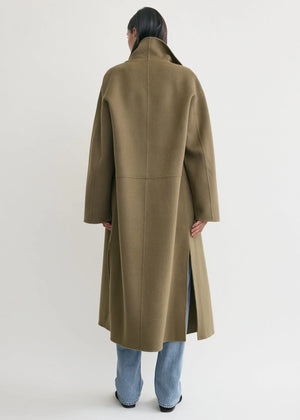 Back view of the TOTEME Signature Doublé Coat in Hazel, displaying the extended sleeves and clean seams.