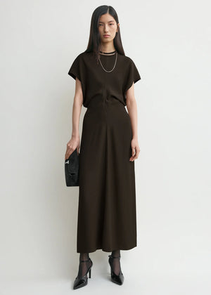Close-up of the slouching waist design of TOTEME's Slouch Waist Dress in Bark.