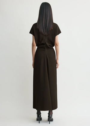 Back view of the TOTEME Slouch Waist Dress in Bark displaying the concealed back zipper.