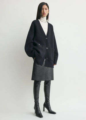 Stylish Longline Cardigan in Navy from TOTEME, perfect for layering with a tee and trousers.