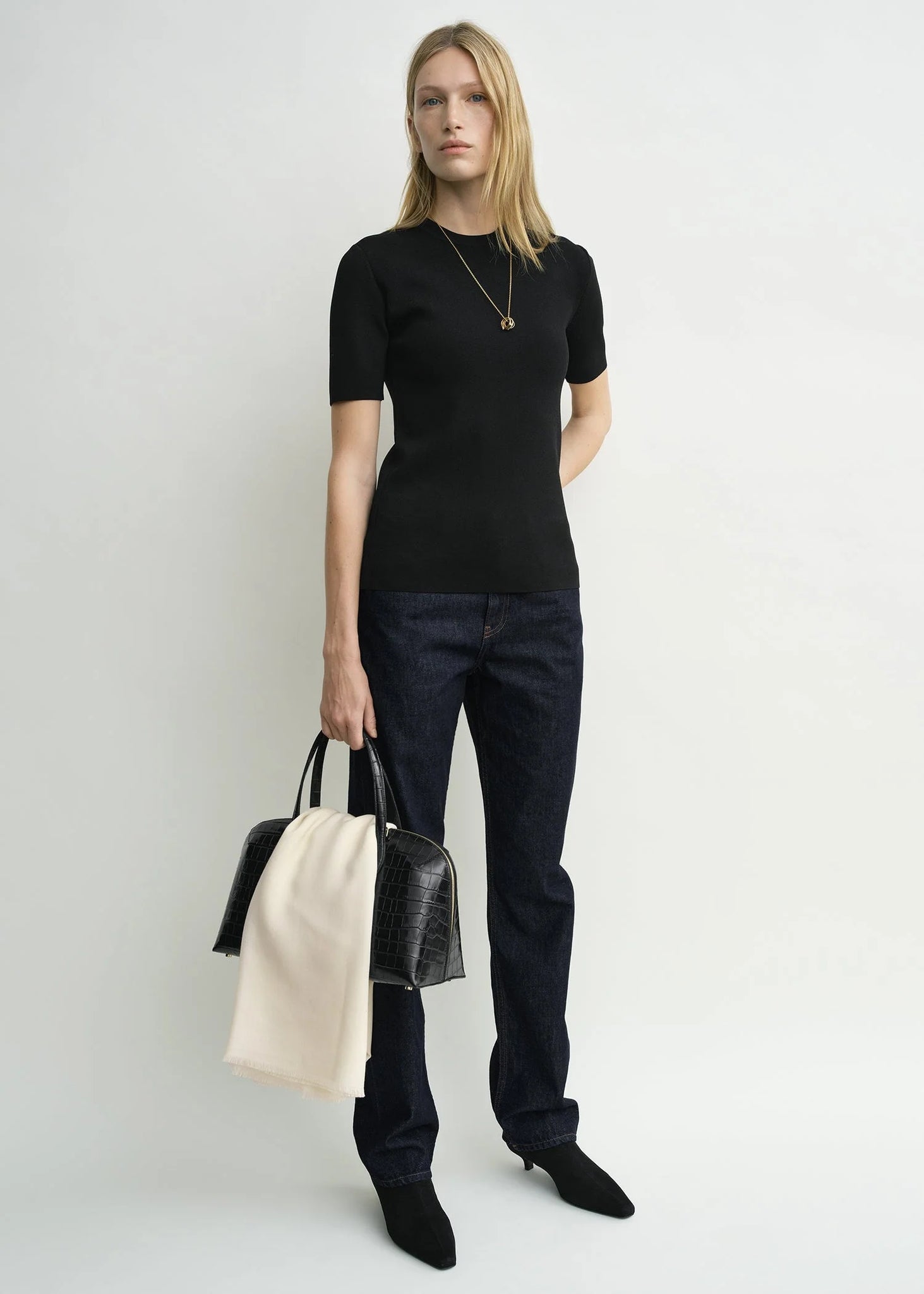 Stylish Compact Knit Top in Black from TOTEME, made from mid-weight jersey for a flattering fit.