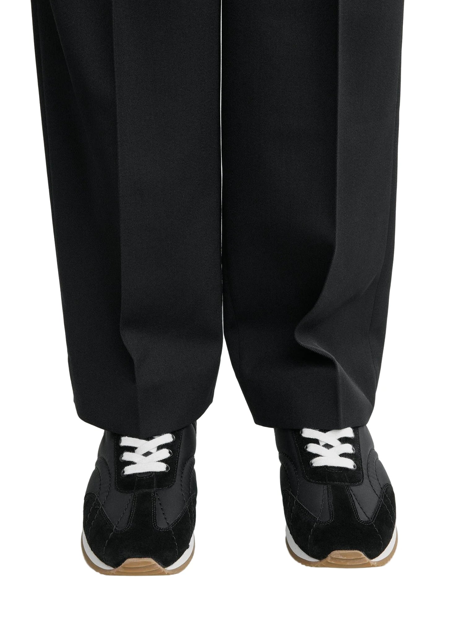 Close-up of TOTEME's Sport Sneakers in Black, highlighting the recycled polyamide materials.