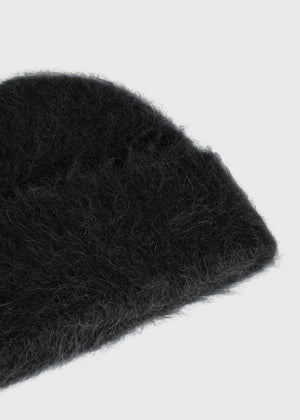 Alpaca Beanie Hat in Black by TOTEME, perfect for winter styling with versatile wear options.