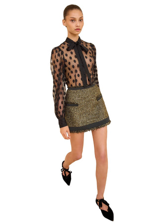 Close-up of the Aleena Skirt in Tapestry featuring taffeta trims and a sleek fit designed by Ulla Johnson.