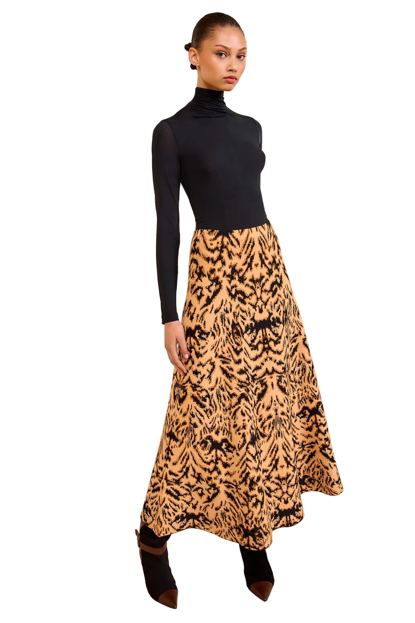 Close-up of the Lani Skirt in Bengal, showcasing the intricate jacquard knit pattern and elastic waist for comfort.